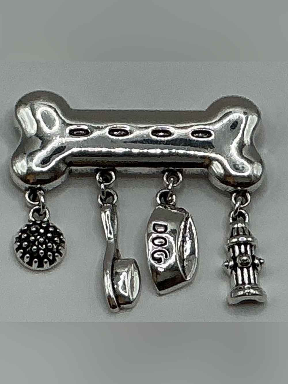 SILVER TONE DOG BONE BROOCH WITH DANGLING CHARMS ACCENTS BRUSH BOWL HYDRANT NWOT